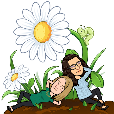 Katie and Rachel relaxing out in nature, surrounded by daisies and grass.